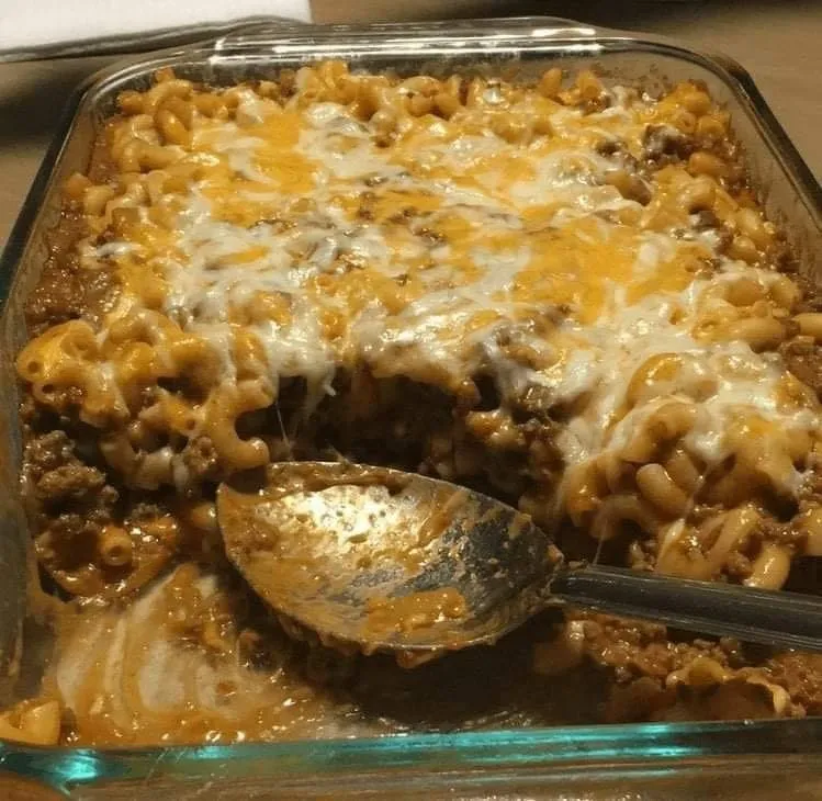 A serving of gooey baked pasta with beef.