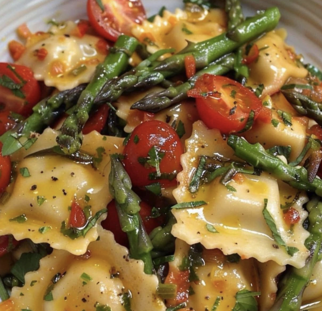 Pasta bowl with veggies and cheese.