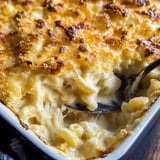 A crispy-topped baked macaroni and cheese with creamy layers underneath.