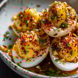 Spiced garlic eggs